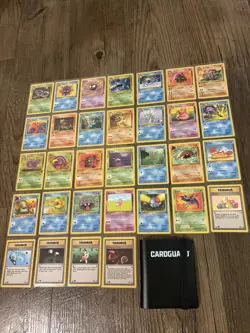 Complete Pokemon Fossil 1st Ed common/uncommon set (31-62) NM/LP + 40card binder - Image 1