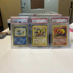 PSA 9 Vaporeon Jolteon Flareon 1st Edition WOTC Jungle Set Vintage Pokemon - Image 1