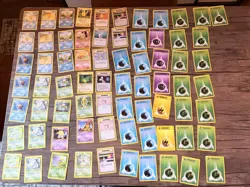 Set of 82 PokeMon Cards and a Burger King Collectible Jigglypuff Gold Card - Image 1