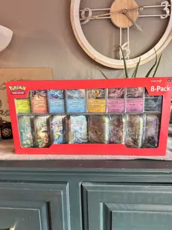 Pokemon TCG - Prismatic Evolutions 8 Mini-Tins w Promo Cards - Costco Exclusive - Image 1