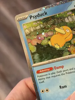 1 SWIRL Pokemon Psyduck Mega Evolutions Holo Black Star Promo 007 NM - Image 3