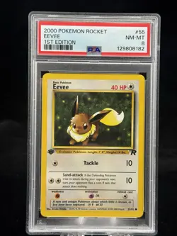 Eevee #55 1st Edition Team Rocket 2000 Pokemon PSA 8 ? - Image 1
