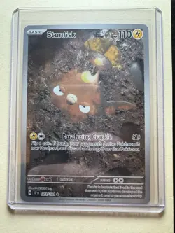Stunfisk 202/191 Surging Sparks Pokemon Illustration Near Mint Condition - Image 1