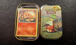 Fuecoco Tin with 50 Assorted Fire Pokemon Cards - Regular Holos & Reverse - Image 1