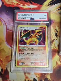 Pokemon Charizard Secret Wonders Holo Rare #3 PSA 7 - Image 1