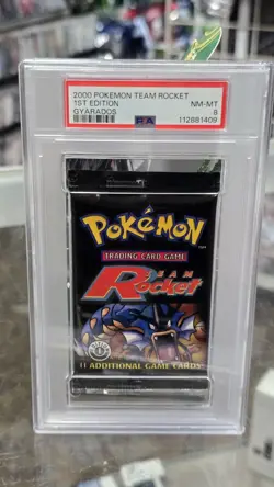 Gyarados PSA 8 Mint TEAM ROCKET 1st Edition Sealed Booster Pack 2000 Pokemon - Image 1