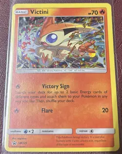 Pokemon TCG Victini SM225 Black Star Promo Holo Card Near Mint Condition - Image 1