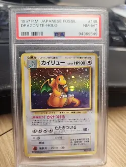 1997 Pokemon Japanese Fossil #149 Dragonite Holo PSA 8 - Image 1