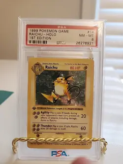 1999 POKEMON BASE SET 1ST EDITION #14 RAICHU-HOLO PSA 8 - Image 1