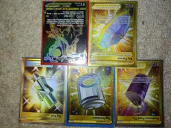 Bundle of 5 gold pokemon cards - Image 1