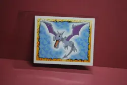 Merlin Topps Pokemon Sticker Aerodactyl #142 Near Mint - Image 1