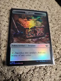 Treasure Human Cleric Double-Sided Token Outlaws of Thunder Junction Foil - Image 1