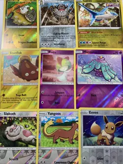 Pokemon TCG Mixed Holo/Reverse Holo Lot Of 9 Slakoth, Yungoos, Eevee - Image 1