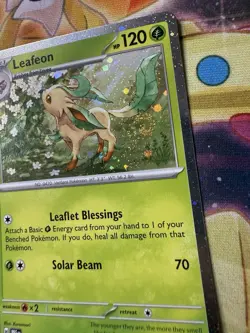 POKEMON LEAFEON 005/131 RARE COSMOS HOLOFOIL WITH SWIRL PRISMATIC EVOLUTIONS NM - Image 2