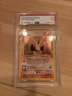 1999 POKEMON FOSSIL #12 MOLTRES-HOLO PSA 7 - Image 1