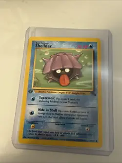 Pokemon TCG Shellder Fossil, 1st Edition Common Card 54/62 NM+ CONDITION - Image 1