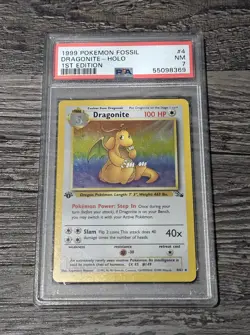 1999 POKEMON FOSSIL 1ST EDITION #4 DRAGONITE - HOLO PSA 7 - Image 1
