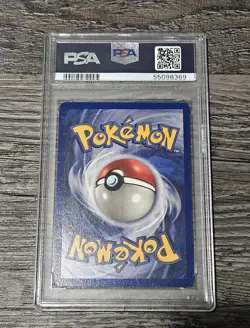 1999 POKEMON FOSSIL 1ST EDITION #4 DRAGONITE - HOLO PSA 7 - Image 2