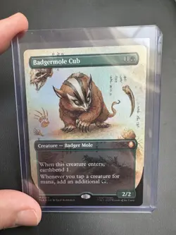 Magic: The Gathering Foil Badgermole Cub Borderless - Image 1