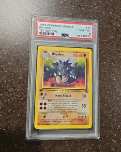 RHYDON #45 1999 POKEMON WOTC JUNGLE 1ST EDITION PSA 8 - Image 1