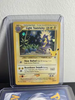 Light Toxtricity SWSH137 Celebrations Promo 25th Anniversary Pokemon Card NM - Image 1