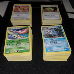 Pokemon Diamond and Pearl trading card lot ~400 cards LP + Rulebooks & Playmat - Image 1