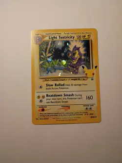 Light Toxtricity SWSH137 Celebrations Promo Card Holo NM - Image 1