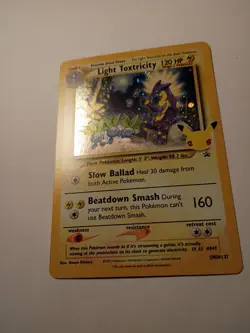 Light Toxtricity SWSH137 Celebrations Promo Card Holo NM - Image 2