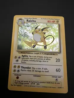 Raichu 14/102 Base Set Unlimited 1999 Pokemon Card Holo Rare NM - Image 1