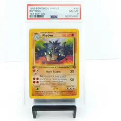 1999 RHYDON #46/64 1st Edition PSA 8 Pokemon Game Card - Image 1