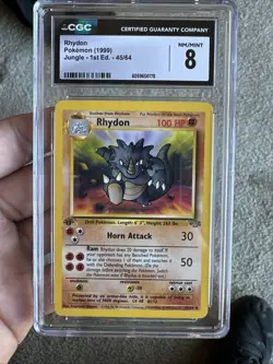 1999 POKEMON JUNGLE - 1ST ED #45/64 RHYDON CGC 8 - Image 1