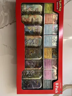 Pokemon Prismatic Evolutions 8 Mini-Tins w Promo Cards Costco - Image 1