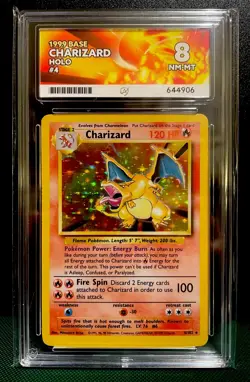 Pokemon TCG - Charizard 004/102 Base Set Holo - ACE graded 8! - Image 1