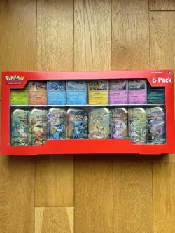 Pokemon TCG: Scarlet & Violet Prismatic Evolutions 8 Pack Mini Tin Set (Costco) - Image 1