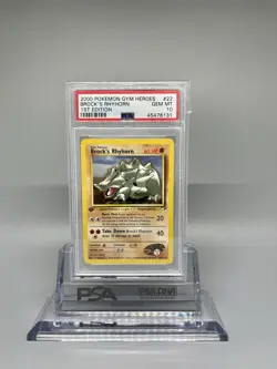 PSA 10 GEM MINT Brock's Rhyhorn 1ST EDITION Gym Heroes Pokemon Card - Image 1