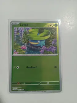 Lotad 005/094 Reverse Holo Phantasmal Flames NM Pokemon Card - Image 1