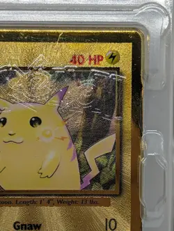 Pokemon Celebrations Gold Metal Charizard & Pikachu cards in original packaging - Image 3
