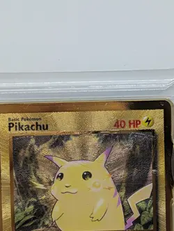 Pokemon Celebrations Gold Metal Charizard & Pikachu cards in original packaging - Image 4