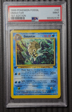 1999 POKEMON FOSSIL 1ST EDITION #52 OMASTAR PSA 9 - Image 1