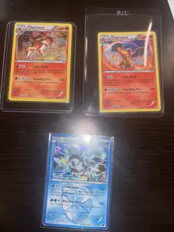 pokemon TCG Cards - 3 Cards For Auction, 2 Charizards And 1 Kyuren TCG small Lot - Image 1