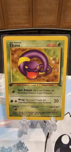 Ekans 46/62 First Edition Fossil Pokemon 1999 NM - Image 1