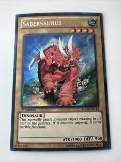Yugioh LCJW-EN143 - Sabersaurus - SECRET RARE 1st Edition - Image 1
