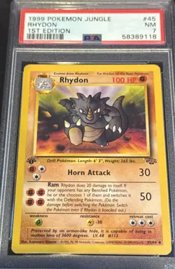 1999 POKEMON JUNGLE RHYDON 1ST EDITION - PSA 7 #45 - Image 1
