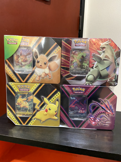 Pokemon TCG: Costco 4 Tin SEALED Set Pikachu Eevee Tyranitar Eternatus V Powers - Image 1