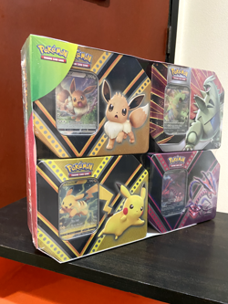 Pokemon TCG: Costco 4 Tin SEALED Set Pikachu Eevee Tyranitar Eternatus V Powers - Image 2