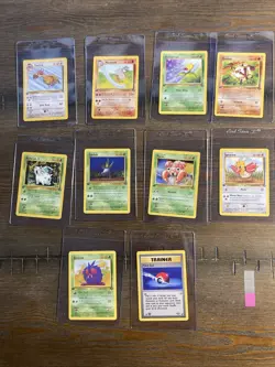 10 1st Edition Jungle Pokemon Trading Card Lot with Trainer and Basic Cards - Image 1