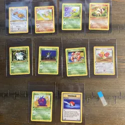 10 1st Edition Jungle Pokemon Trading Card Lot with Trainer and Basic Cards - Image 2
