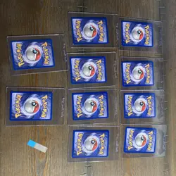 10 1st Edition Jungle Pokemon Trading Card Lot with Trainer and Basic Cards - Image 3