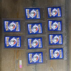 10 1st Edition Jungle Pokemon Trading Card Lot with Trainer and Basic Cards - Image 4
