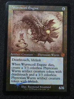 Wurmcoil Engine (Schematic) The Brothers' War: Retro Frame Artifacts Foil - Image 1